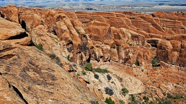 a couple of unnamed arches and fins catching the sun