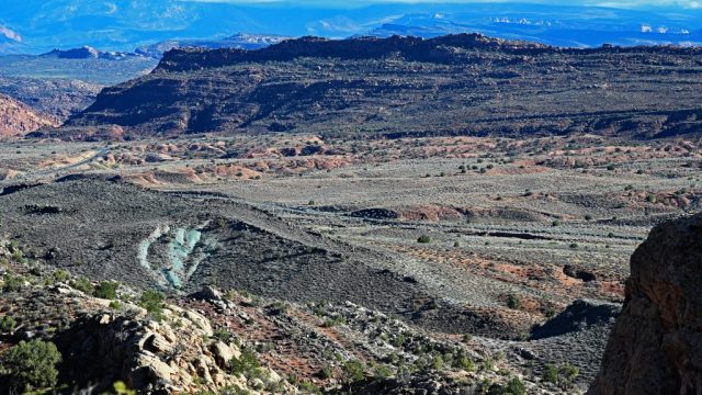 the desert before dusk — a furnace of living color.