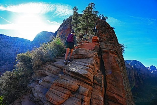 view upward toward the exposed ridge, glowing in bright morning light. view upward toward the exposed ridge, glowing in bright morning light.