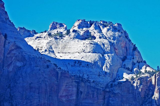 the sundial, a striking formation of stone and shadow towers o
